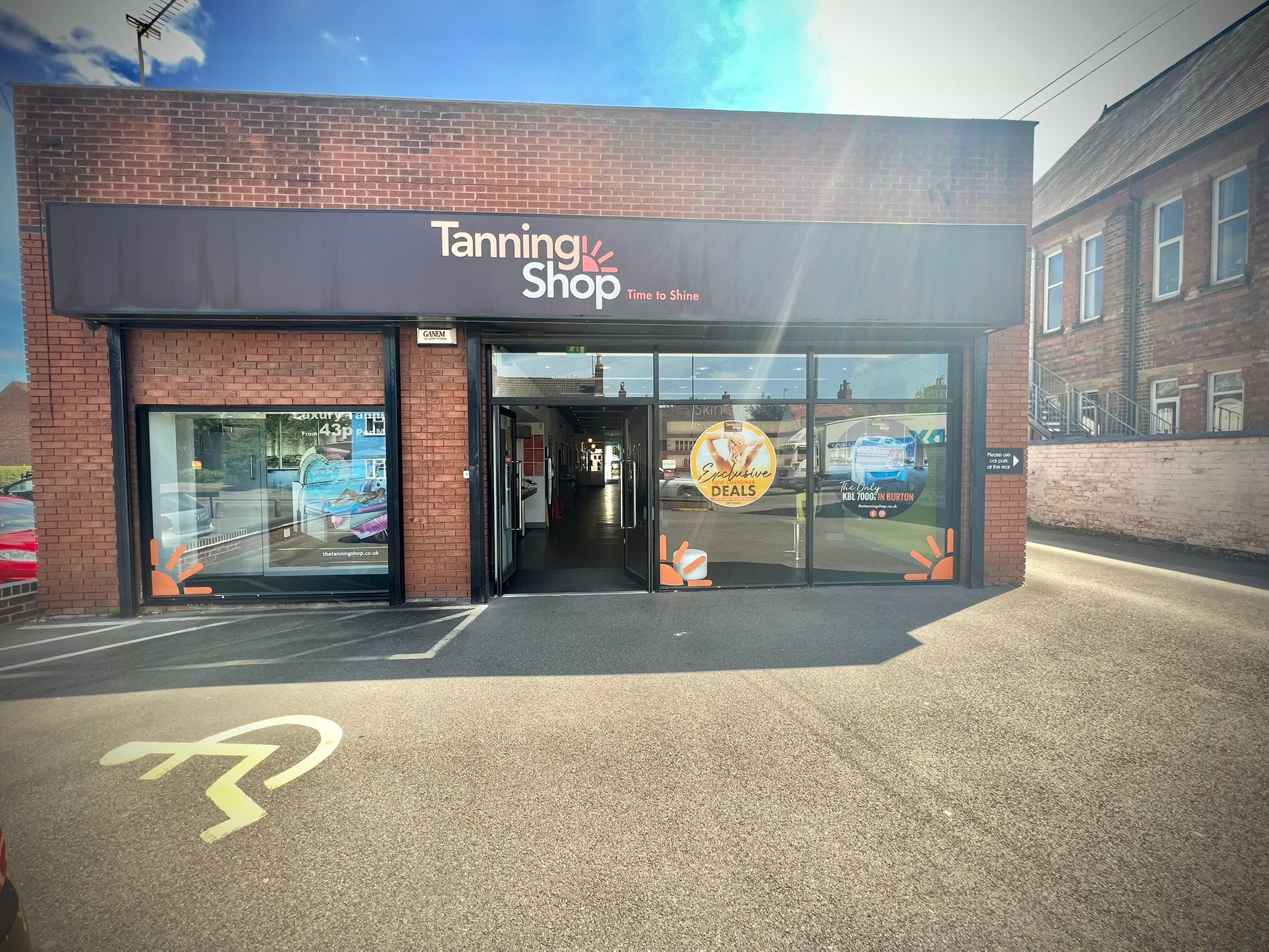 Burton Tanning Shop Burton Store front