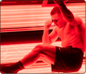Man receiving red light therapy treatment at The Tanning Shop UK