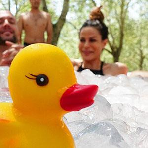 Ice bath cryotherapy fun - people with rubber duck in ice bath cold water therapy at The Tanning Shop UK