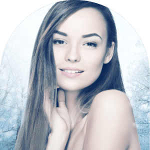 Woman with long blonde hair and bare shoulders smiling, with clear glowing skin, representing cryotherapy benefits at The Tanning Shop
